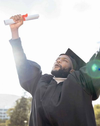 Graduation, cheering and black man celebrate success, achievement and college target. Happy graduat.